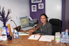 Dr. Maribel A. Celebrado at her desk in her El Cajon practice